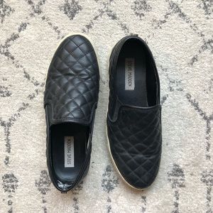 Steve Madden black quilted slip on sneakers